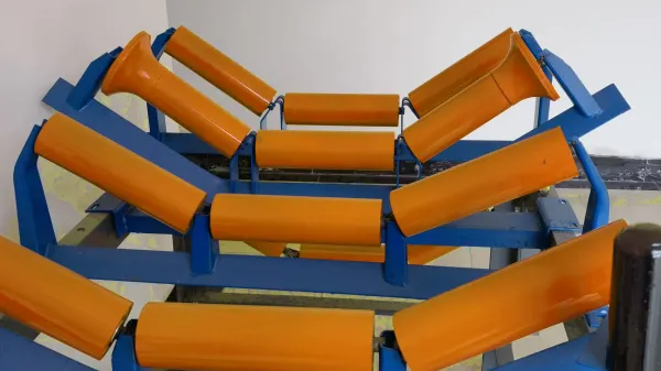 carrying idler for belt conveyor